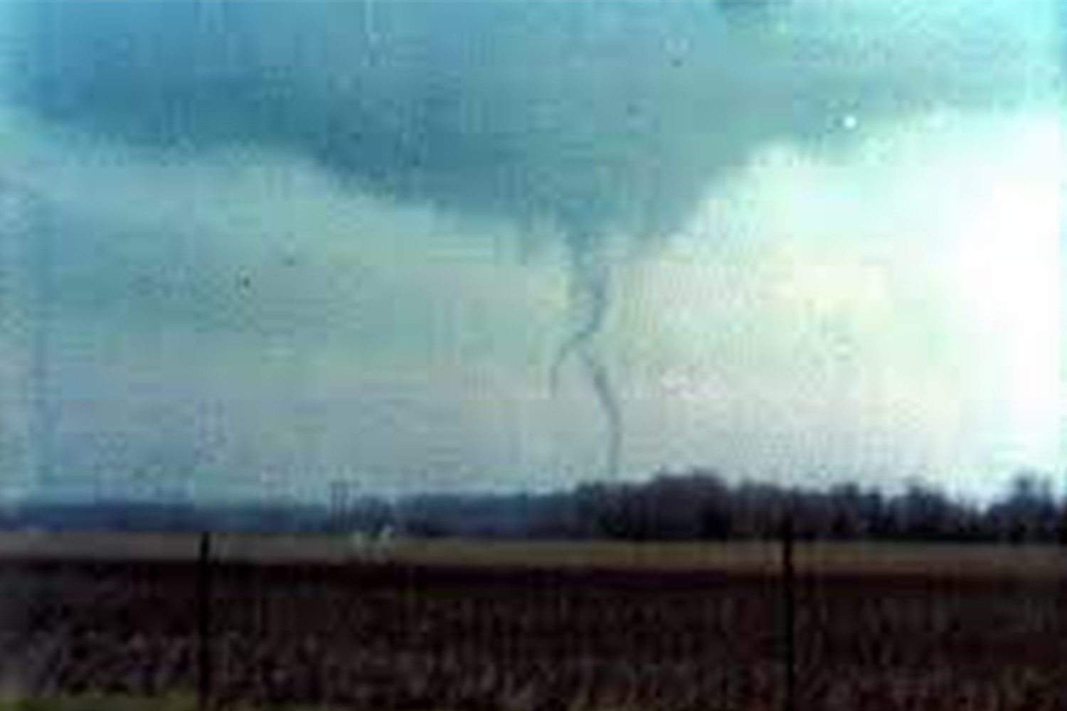 The tornado forming. Photo taken by Homer G. Ramby.